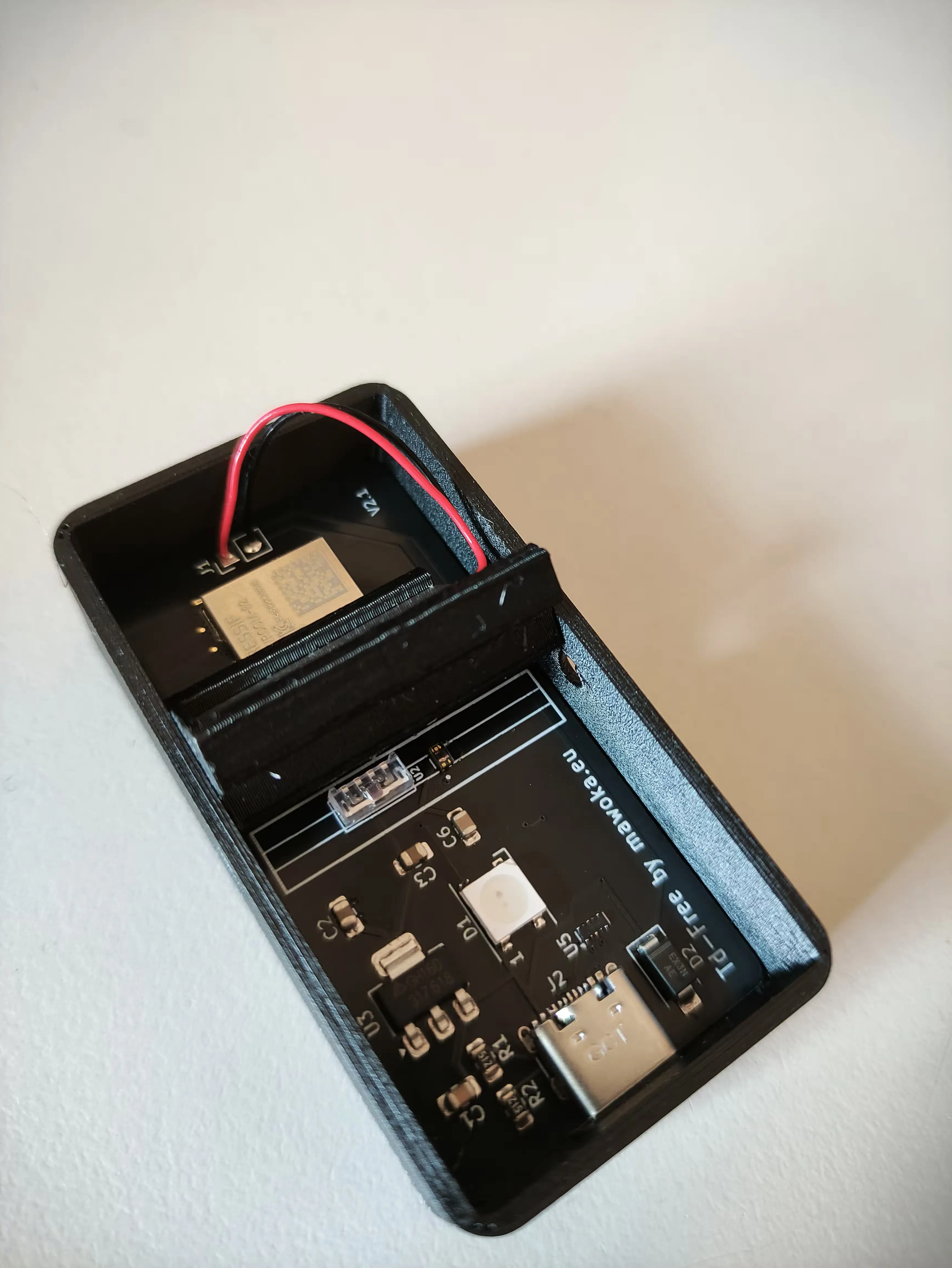PCB now inserted at an angle into case