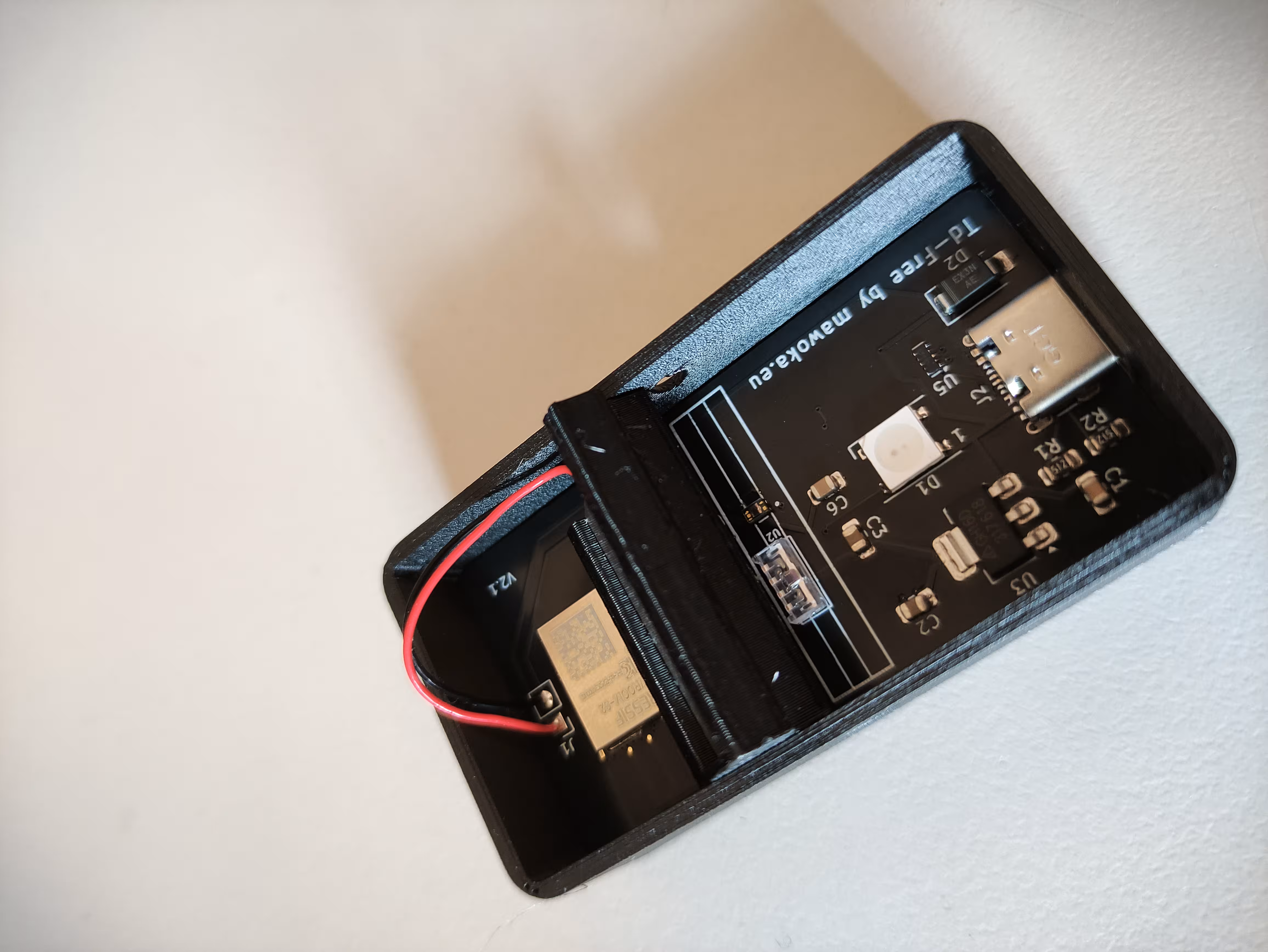 PCB now inserted at an angle into case