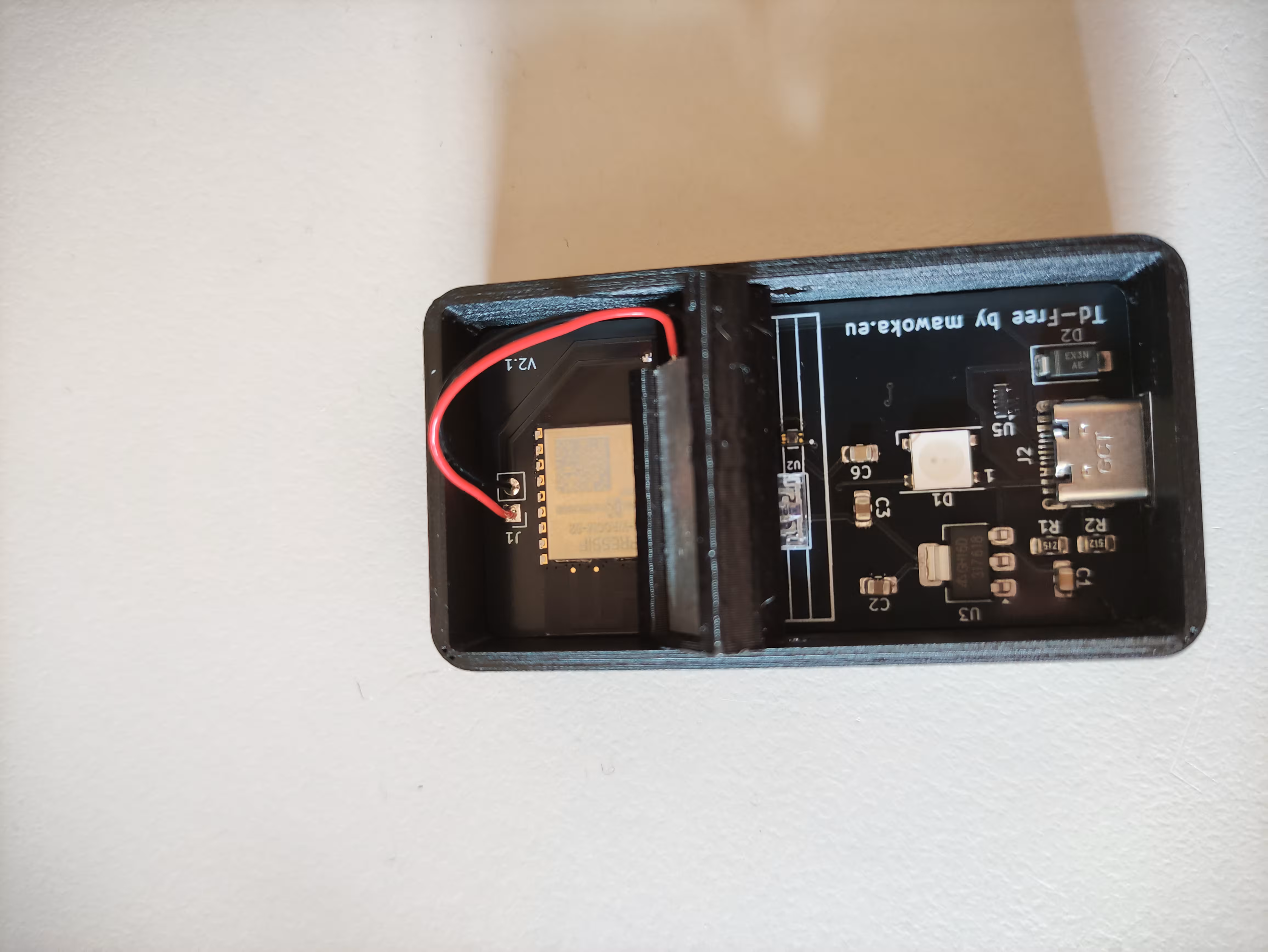 PCB now inserted at an angle into case