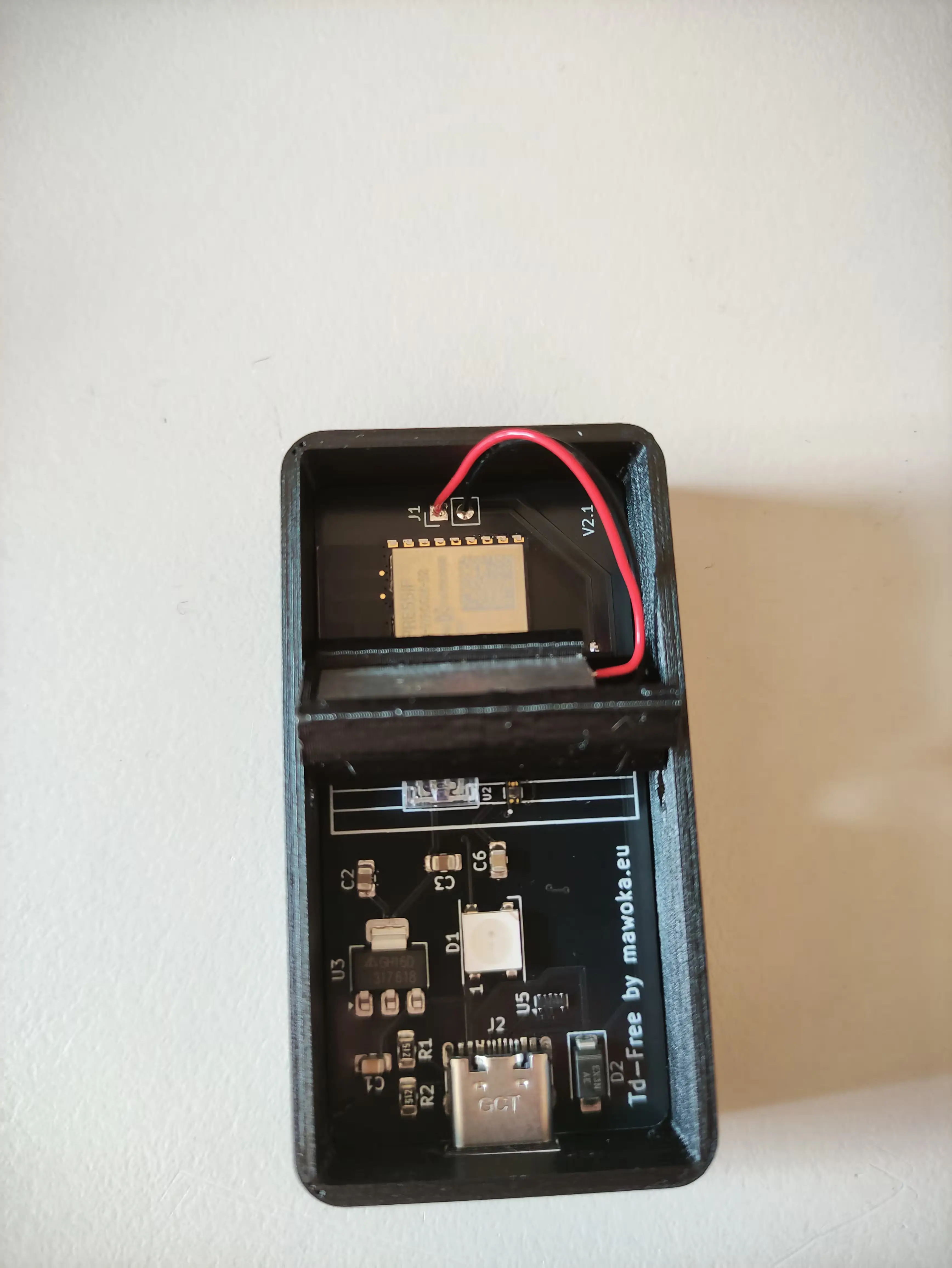 PCB now inserted at an angle into case